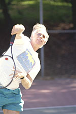 Paul playing tennis